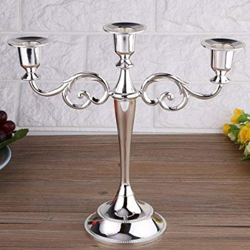Three-armed candlestick candlestick silver plated. Three-armed candlestick candlestick silver plated.